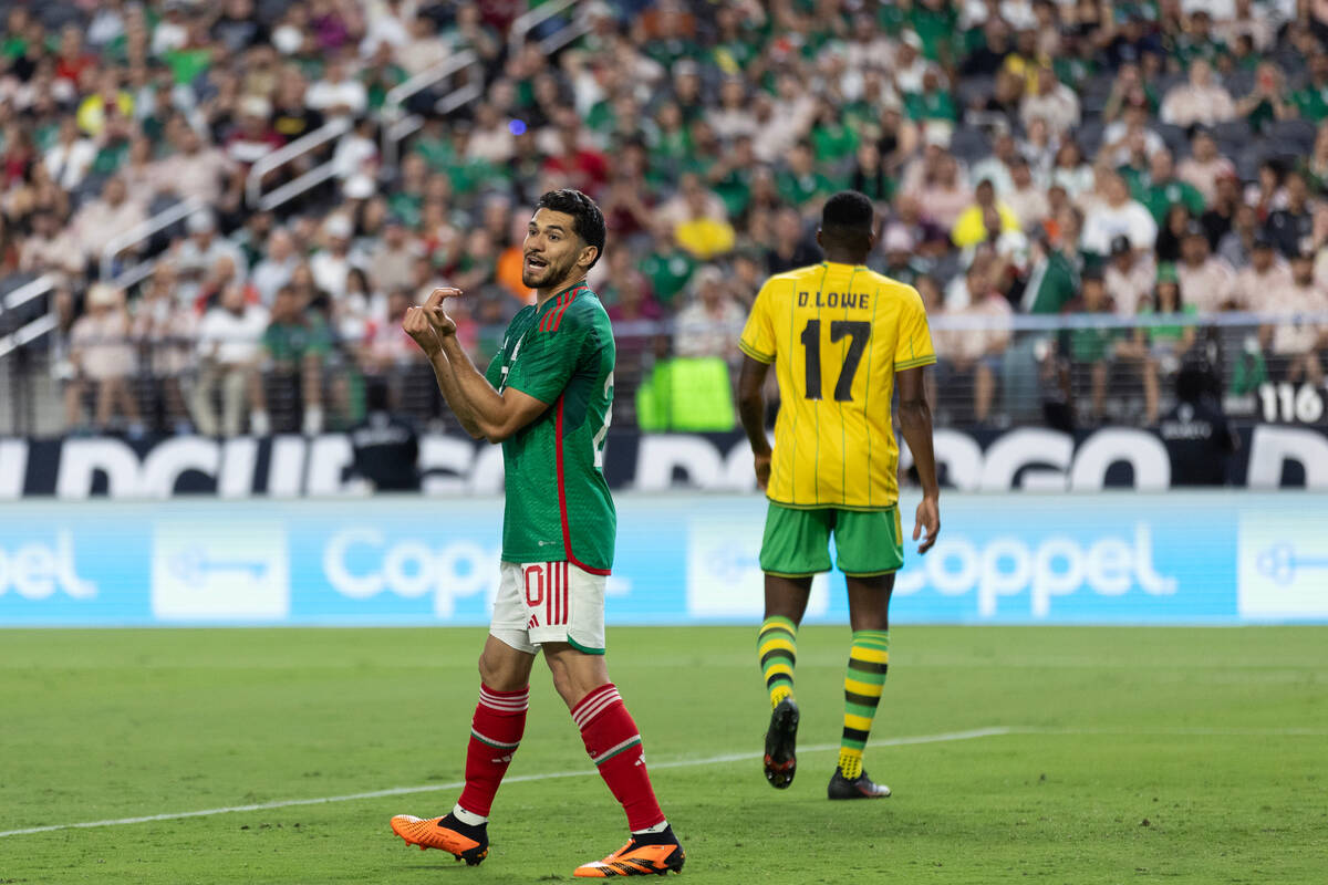 Mexico forward Henry Martín (20) gestures to a teammate after they attempted to score on J ...