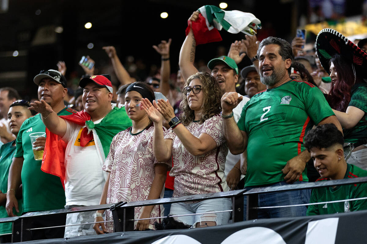 Mexico fans cheer for their team during the second half of a CONCACAF Gold Cup semifinal soccer ...