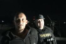 A Nye County sheriff's deputy leads beating, kidnapping suspect Ryan Sanders after he is arrest ...