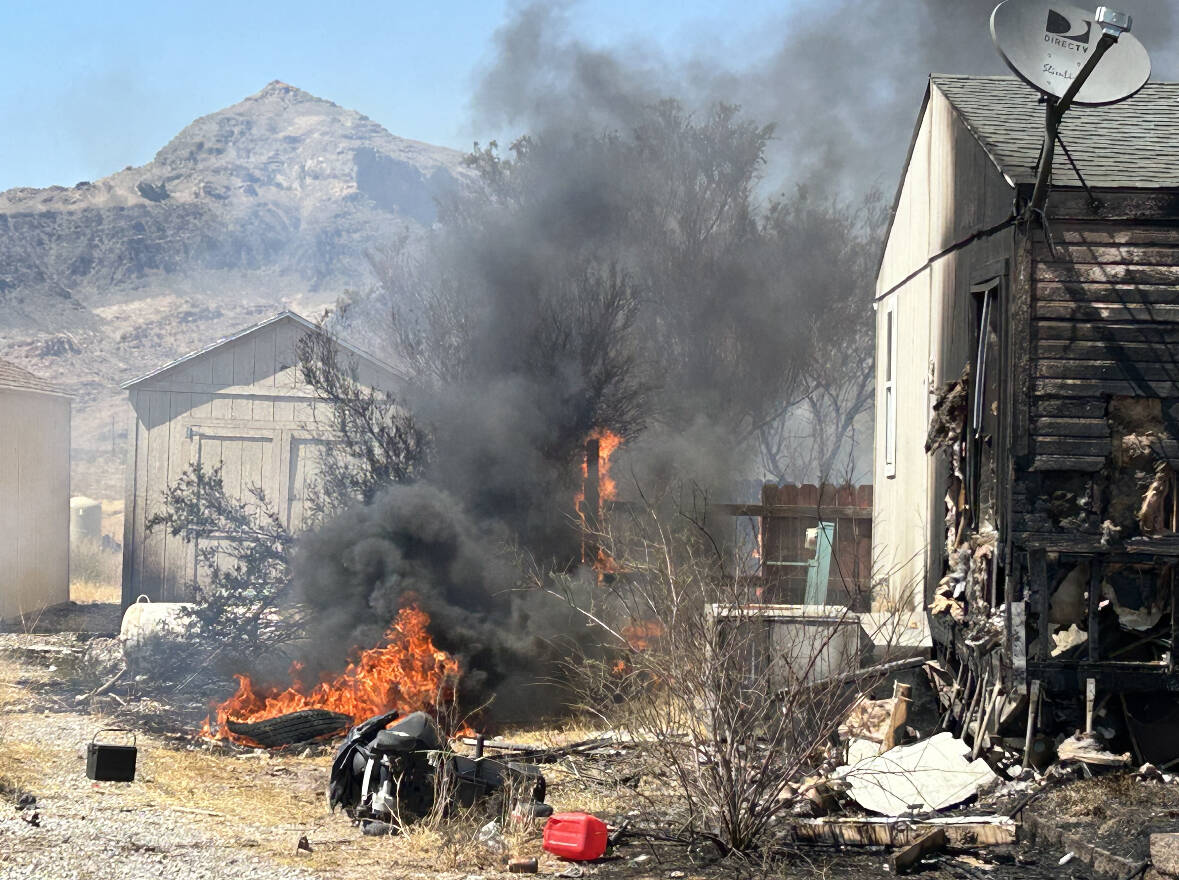 John Clausen/Pahrump Valley Times Local crews are back at a structure fire that reignited somet ...