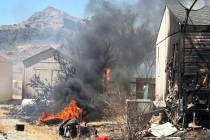 John Clausen/Pahrump Valley Times Local crews are back at a structure fire that reignited somet ...