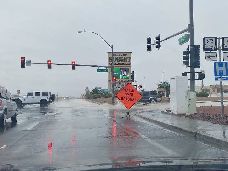 Nye County Water stood over the roadway at the intersection of highways 160 and 372 in Pahrump ...