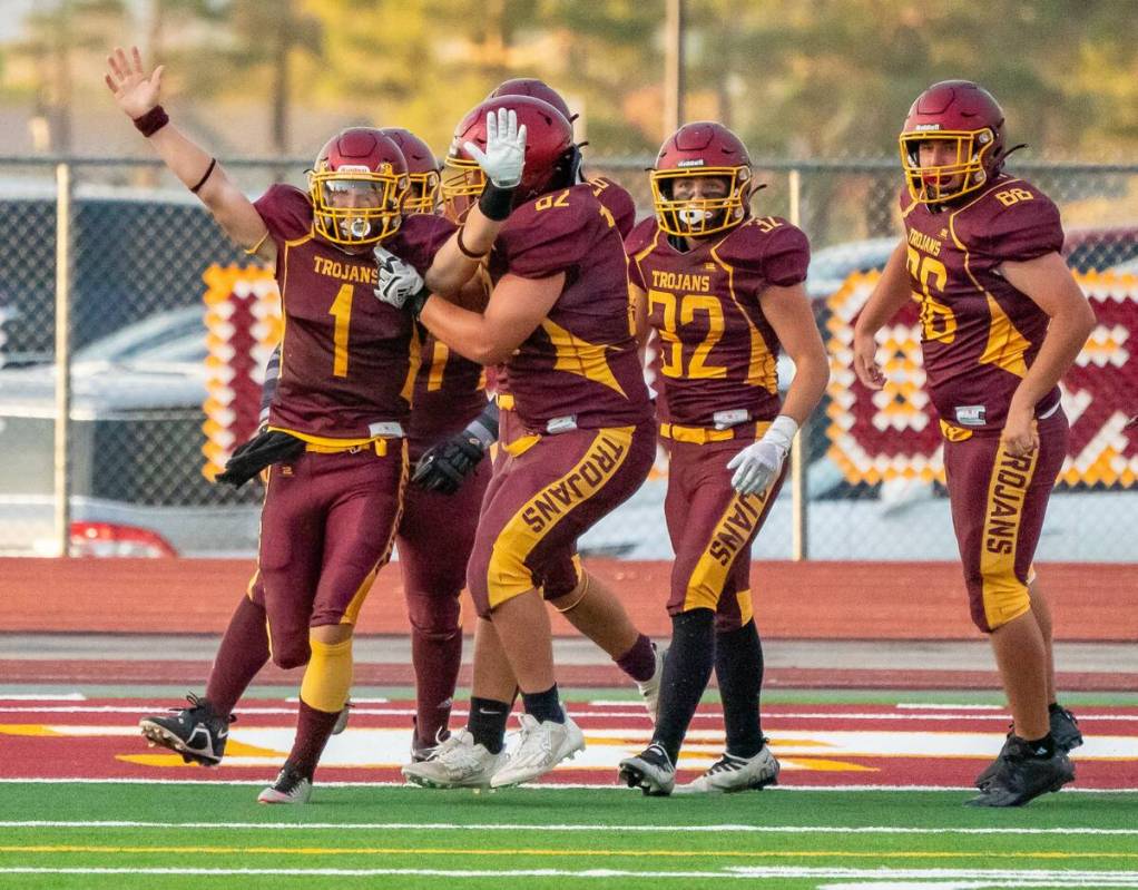 John Clausen/Pahrump Valley Times The Pahrump Valley offense celebrates with senior Brennen Ben ...