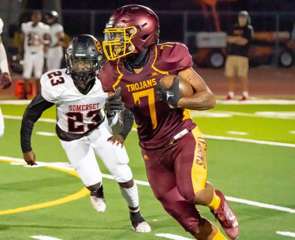 John Clausen/Pahrump Valley Times Senior running back LJ Reddick (7) runs for a 25-yard gain to ...