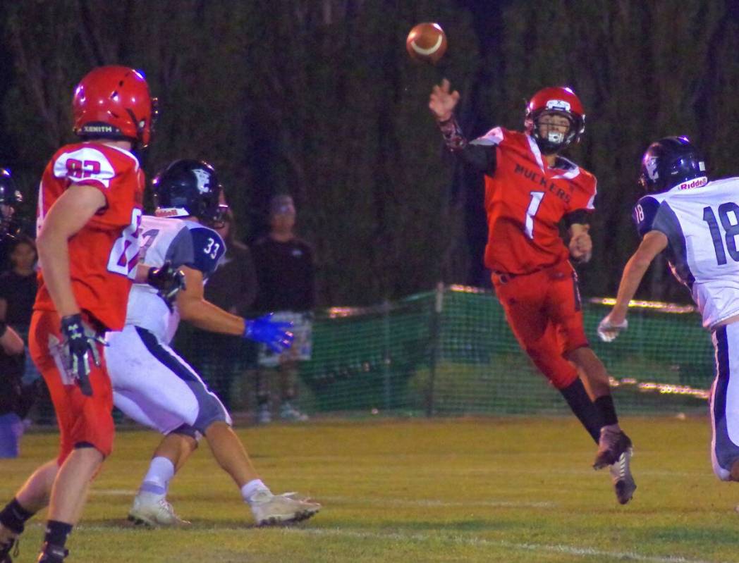 Marcus Prazniak/Tonopah Times Sophomore quarterback Drew Otteson (1) looks to pass down the fi ...