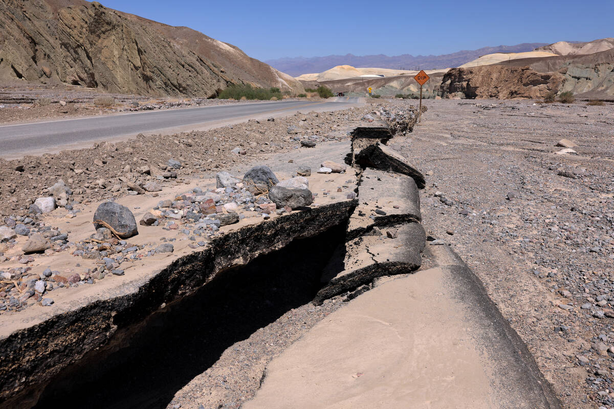 Storm damage from Hilary is shown on State Route 190 on the way to Furnace Creek in Death Valle ...