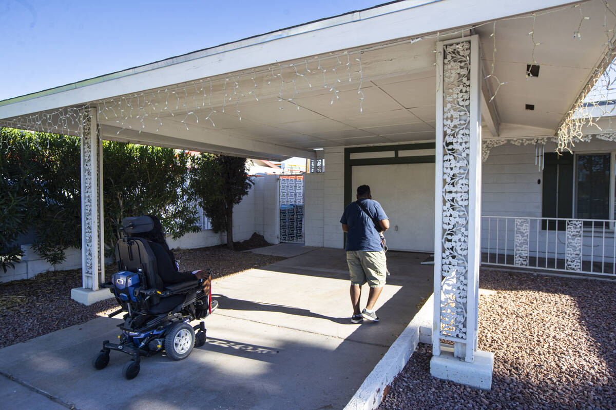 Stephanie Parys, left, arrives home from an appointment with Nicole Brown, her home care worker ...