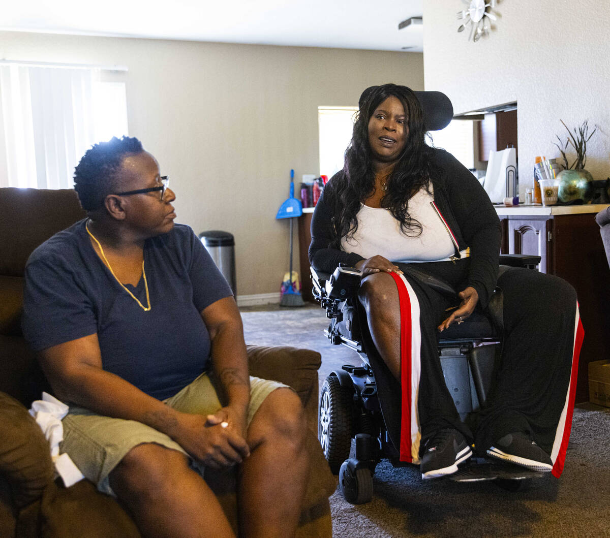 Stephanie Parys, right, talks about her home care worker, Nicole Brown, on Tuesday, Aug. 29, 20 ...