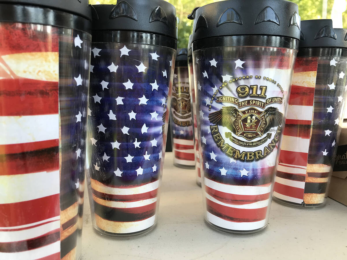 Robin Hebrock/Pahrump Valley Times Memorabilia such as these drink tumblers were available at t ...