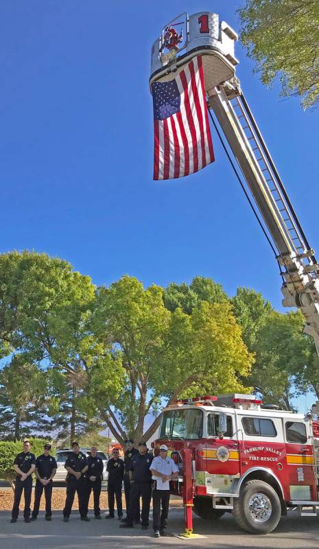 Robin Hebrock/Pahrump Valley Times A group of area first responders is shown standing with the ...