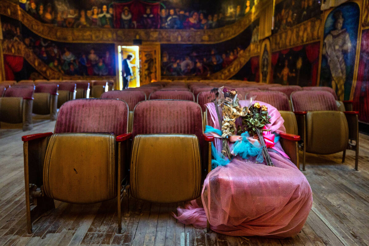 A chair for former owner and performer Marta Becket is covered with flowers in her honor within ...