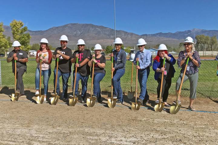 Robin Hebrock/Pahrump Valley Times Officials with Nye County and the town of Pahrump are joined ...