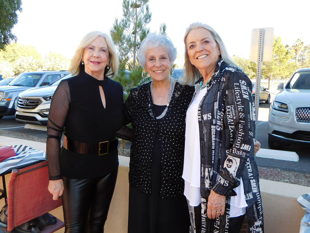 Robin Hebrock/Pahrump Valley Times Pahrump resident Willi Baer, center, stands with two of her ...