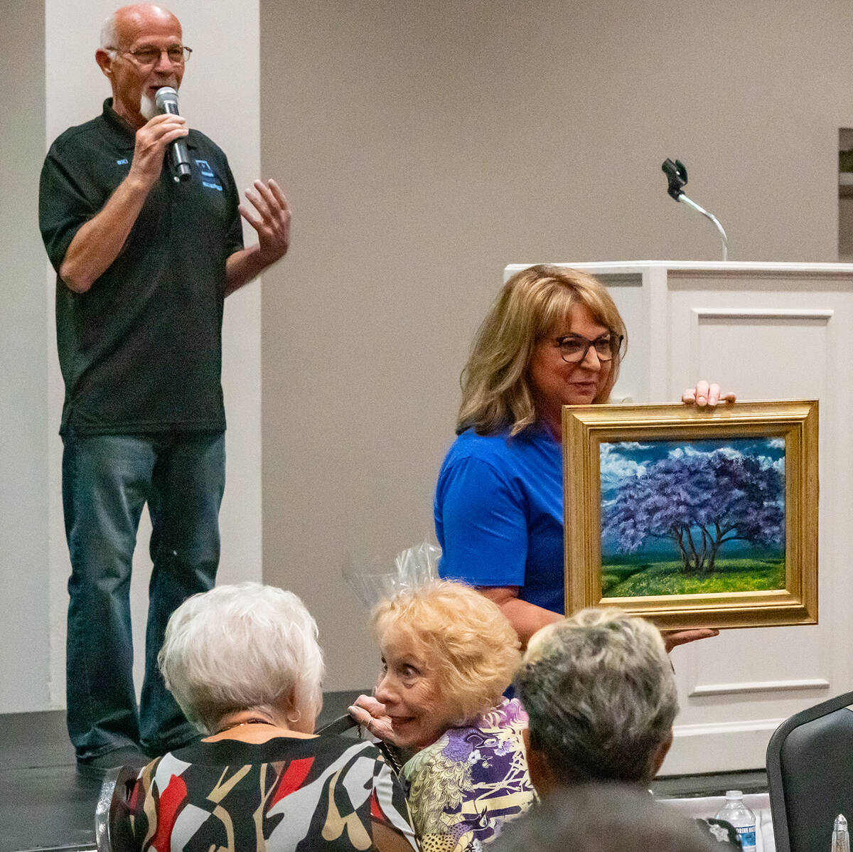 John Clausen/Pahrump Valley Times Auctioneer Ski Censke and Living Free founder Shelley Poerio ...