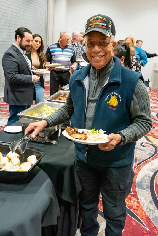 John Clausen/Pahrump Valley Times Dr. Tom Waters is pictured loading his dinner plate at the Ar ...