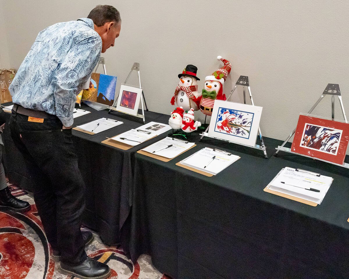 John Clausen/Pahrump Valley Times The Art for Recovery event included a live auction as well as ...
