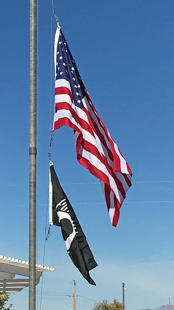 Robin Hebrock/Pahrump Valley Times The American flag and the POW/MIA flag, which honors Prisone ...
