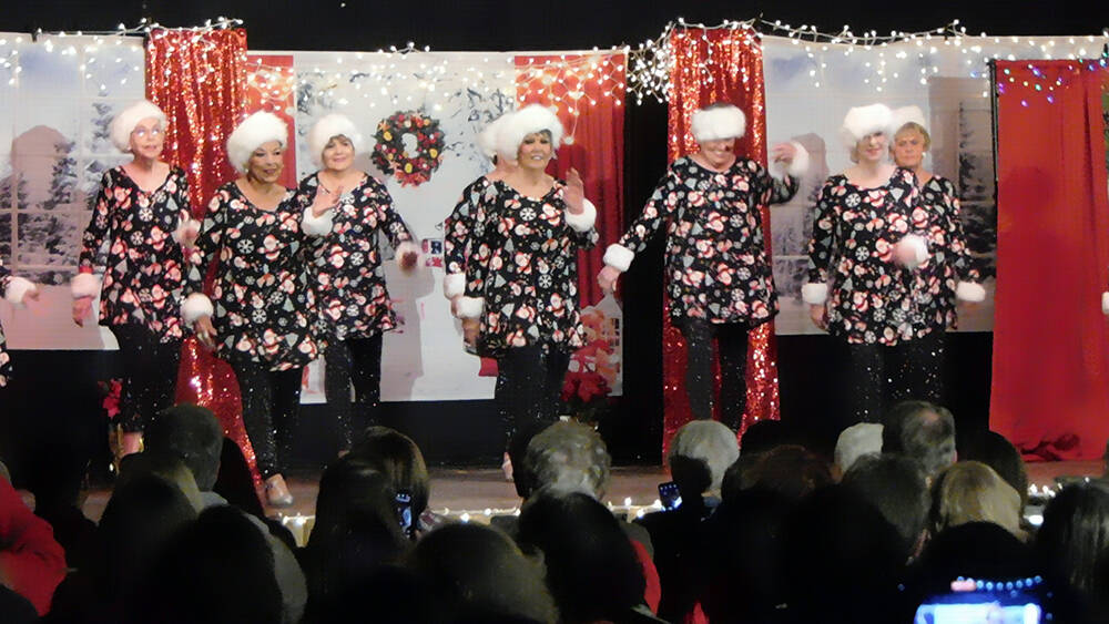 Robin Hebrock/Pahrump Valley Times Silver Tappers sashay around the stage at the Christmas Bene ...