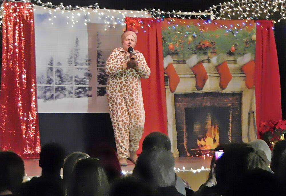 Robin Hebrock/Pahrump Valley Times Shelley Fisher infuses some humor into the Christmas Benefit ...