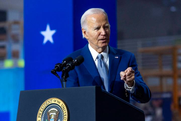 President Joe Biden points to a member of the Nevada Legislature as he speaks during a gatherin ...