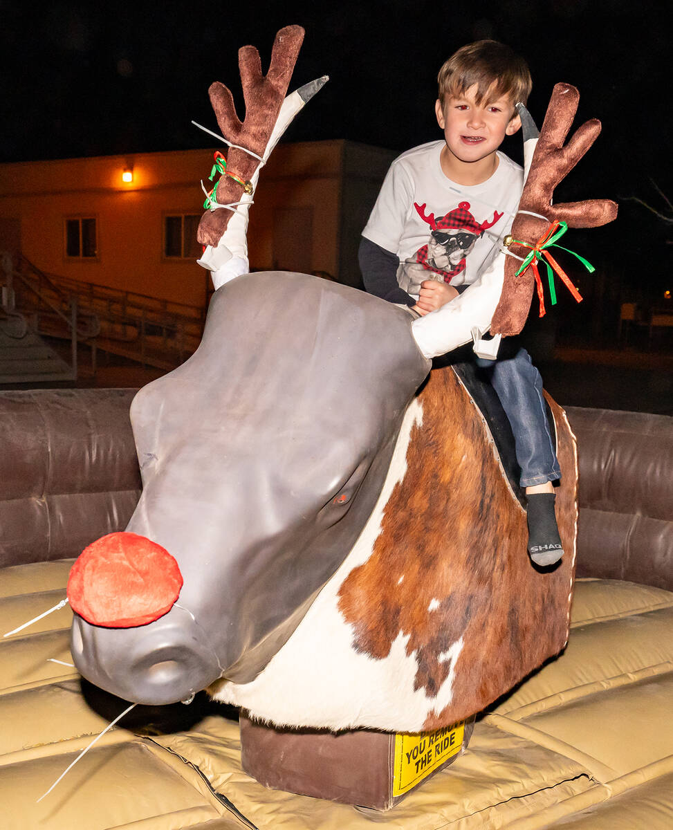 John Clausen/Pahrump Valley Times Rides on the mechanical "reindeer" were a popular activity at ...