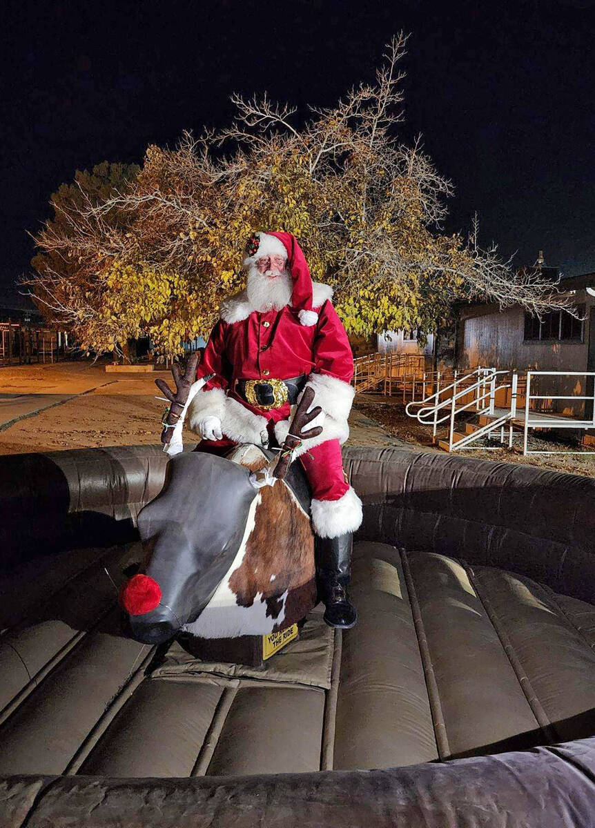 PDOP/Special to the Pahrump Valley Times Santa sits astride the mechanical "reindeer" at Cookie ...
