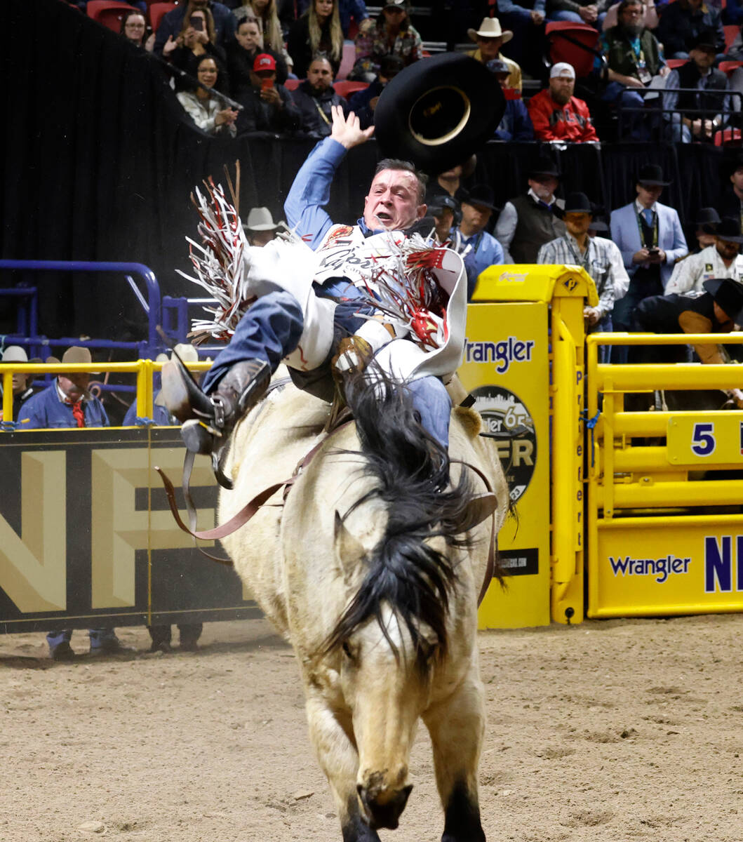 Tim O'Connell holds on to his horse while he competes in bareback riding on day six of the Nati ...