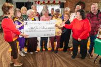 John Clausen/Pahrump Valley Times The proceeds from the Christmas Benefit Show were presented t ...
