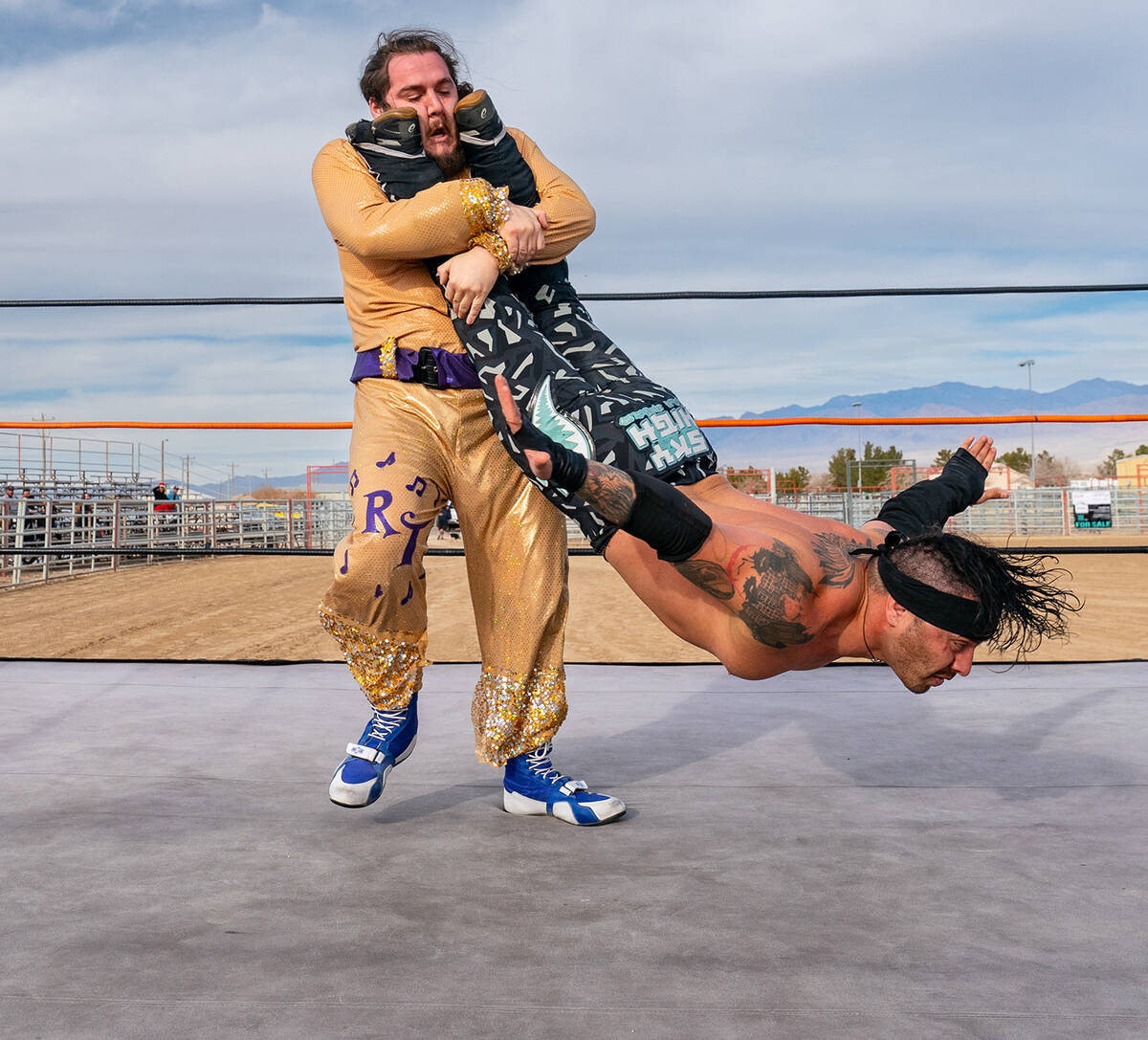 John Clausen/Pahrump Valley Times Pro wrestlers are pictured battling it out in the ring at Win ...