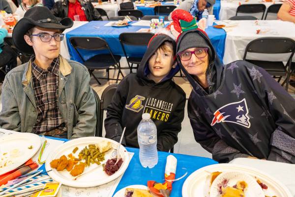 John Clausen/Pahrump Valley Times A family gathers at the Pahrump Christmas meal.