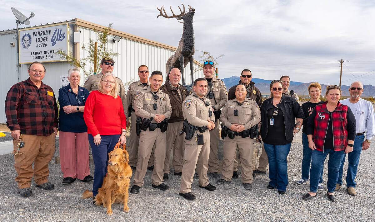 John Clausen/Pahrump Valley Times These are the officers with NCSO, Elks Lodge members and DCFS ...