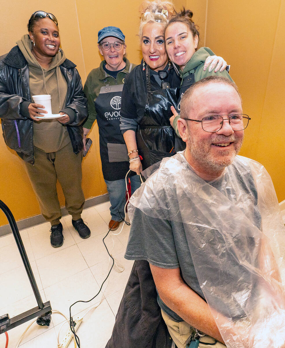 John Clausen/Pahrump Valley Times A gentleman is shown at the haircutting station at the Dec. 1 ...