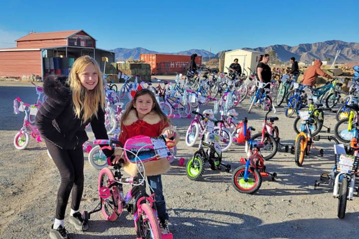 Special to the Pahrump Valley Times Avery Sampson, left, is pictured with a young girl at the b ...