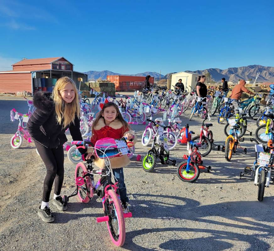 Special to the Pahrump Valley Times Avery Sampson, left, is pictured with a young girl at the b ...