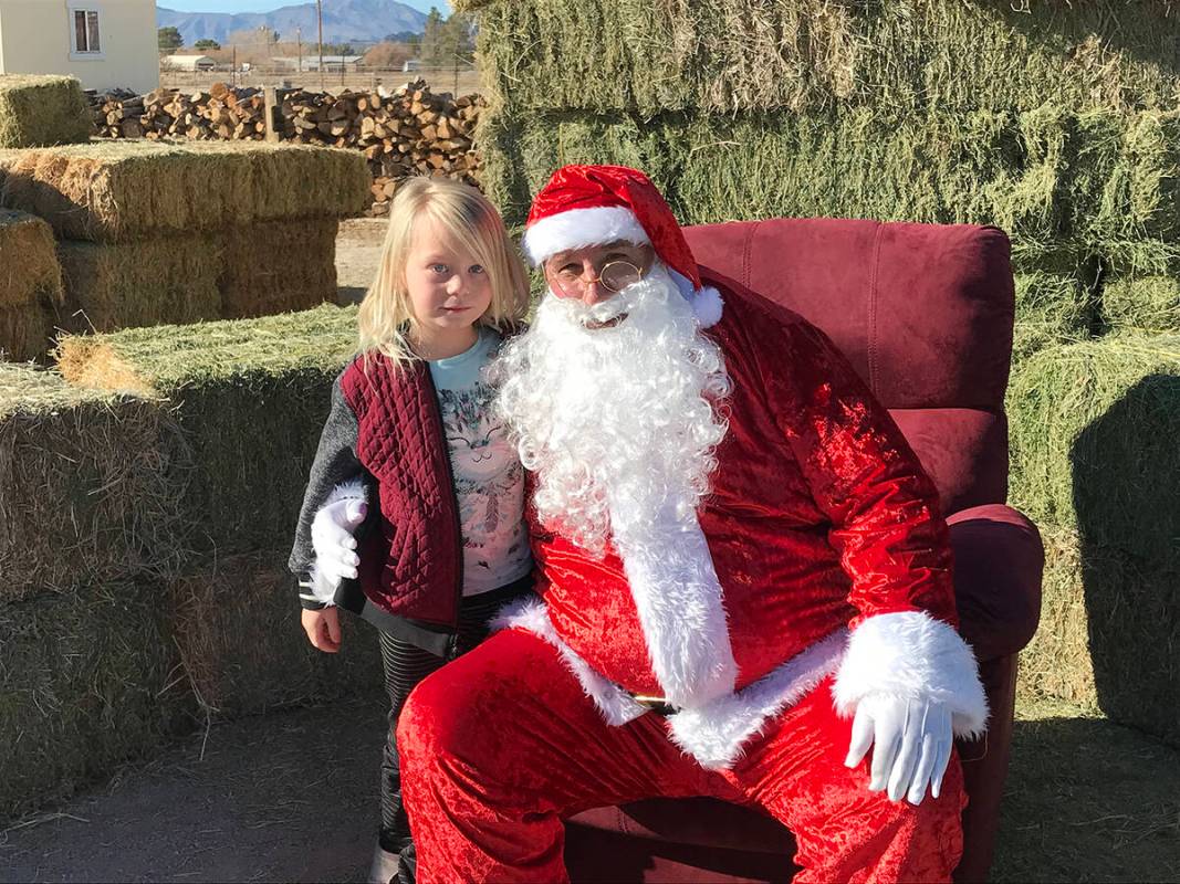 Robin Hebrock/Pahrump Valley Times Santa Claus was at The Avery Project's bike giveaway event o ...