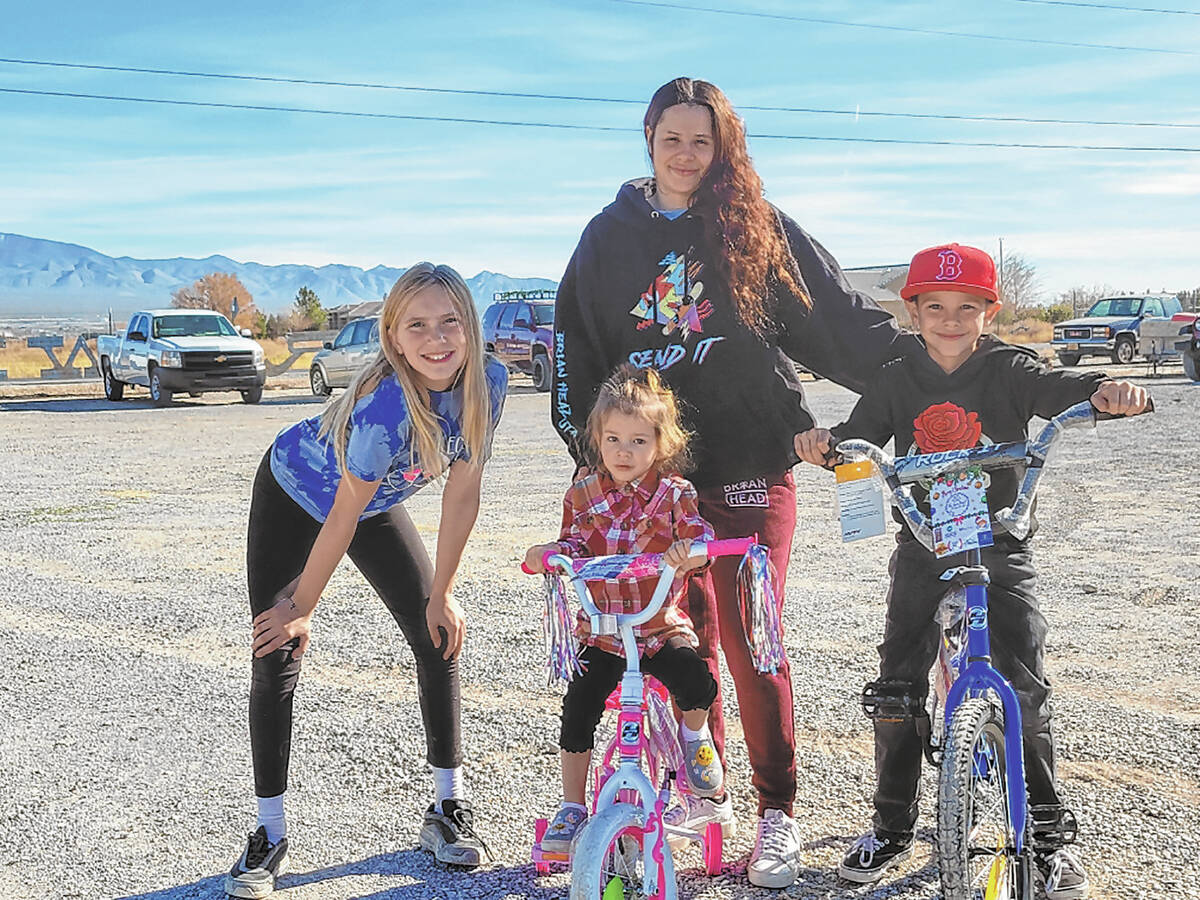 Special to the Pahrump Valley Times Avery Sampson, left, is pictured with a young girl at the b ...