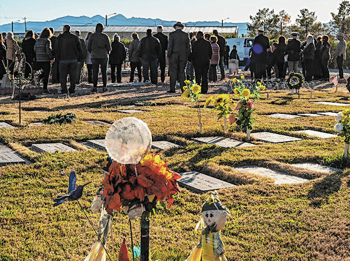 John Clausen/Pahrump Valley Times Mourners convene at Chief Tecopa Cemetery to say ...