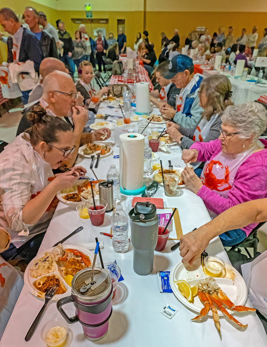 John Clausen/Pahrump Valley Times Crab Fest feasters are pictured chowing down on their meal.