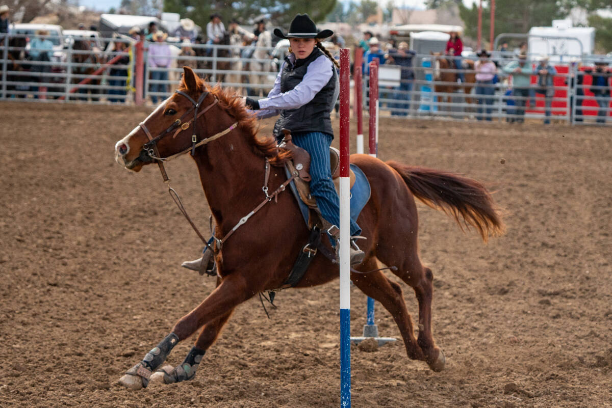 A woman on horseback competing at the Pahrump Junior High and High School Rodeo at the McCullou ...