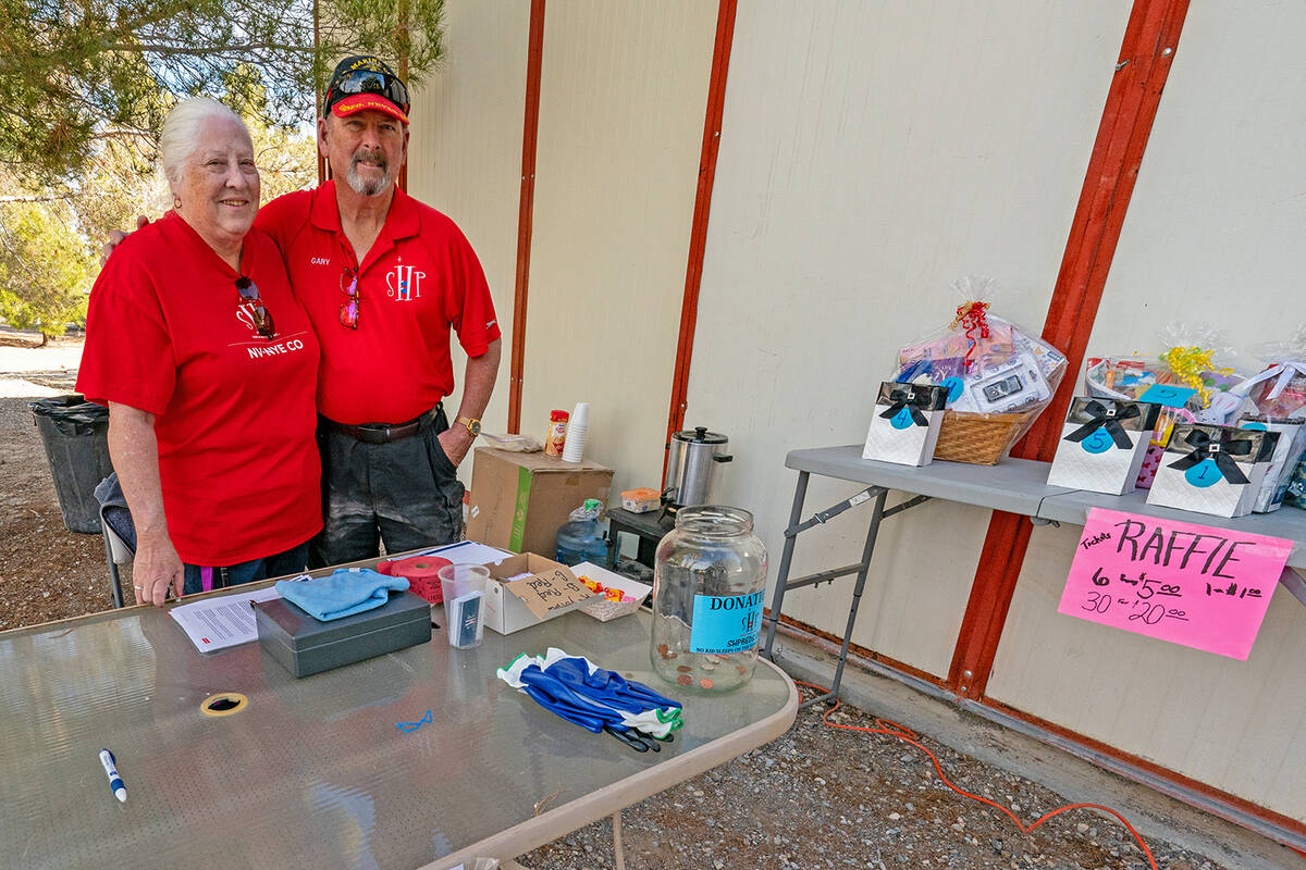 John Clausen/Pahrump Valley Times Ruth McDowell and Gary Bennett helped register volunteers at ...