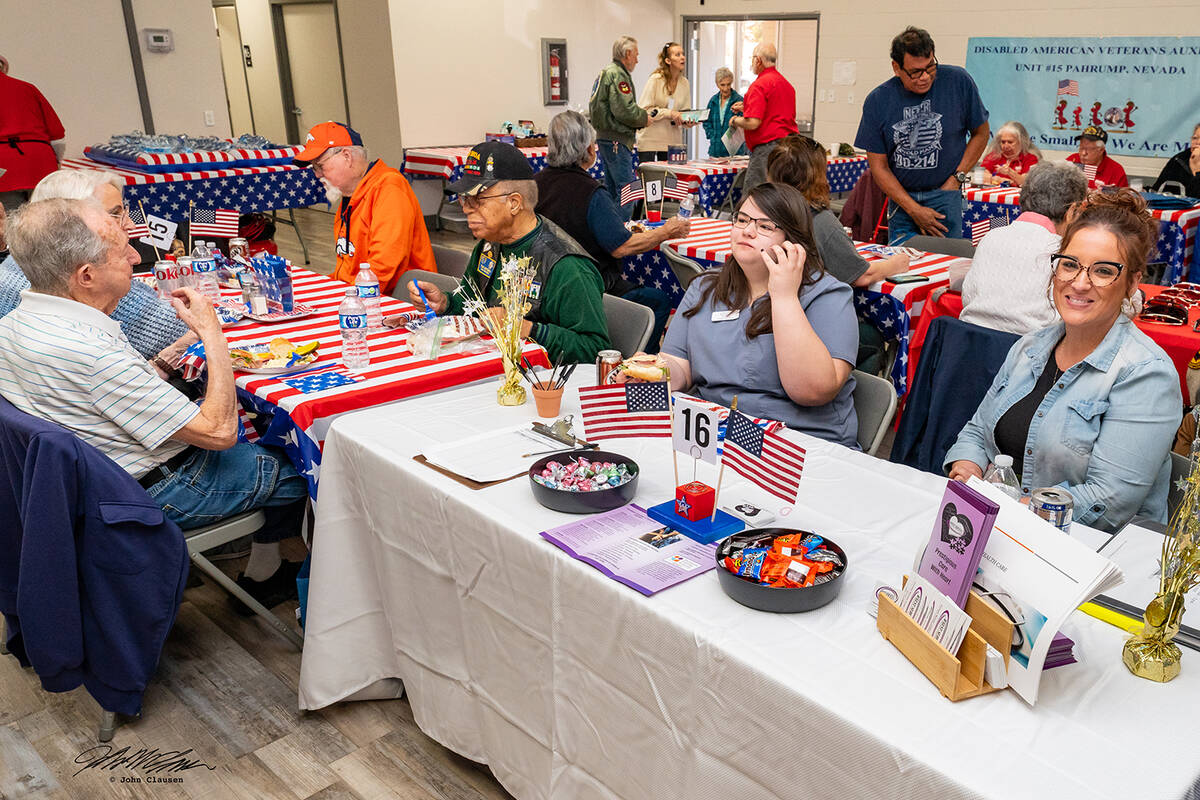 John Clausen/Pahrump Valley Times Veterans are pictured enjoying lunch amid the bustle of activ ...