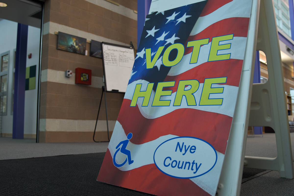 A "Vote here," sign inside the Great Basin College campus for the primary election on Tuesday, ...