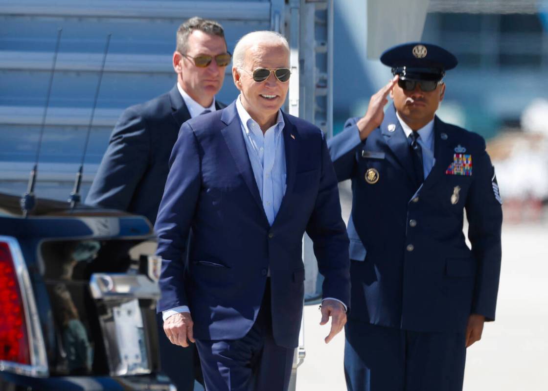 President Joe Biden arrives at Harry Reid International Airport, on Tuesday, March 19, 2024, in ...