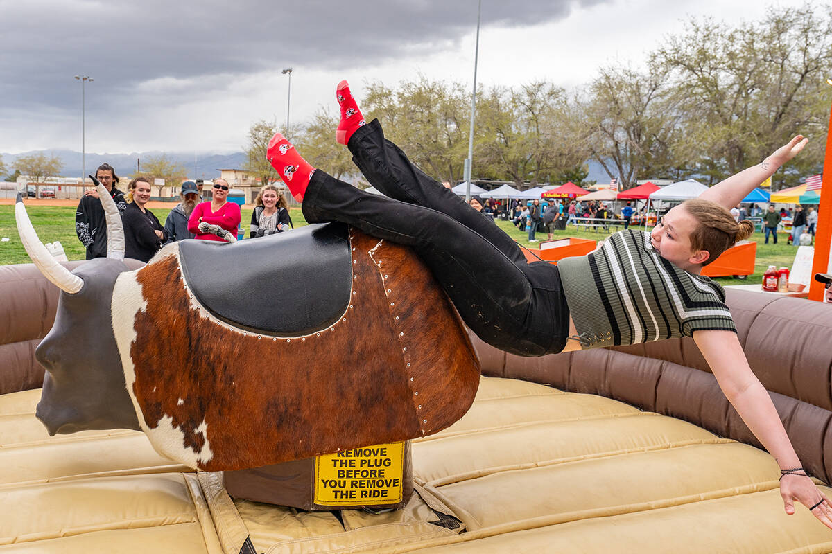John Clausen/Pahrump Valley Times Mechanical bull rides gave thrill-seekers something extra fun ...