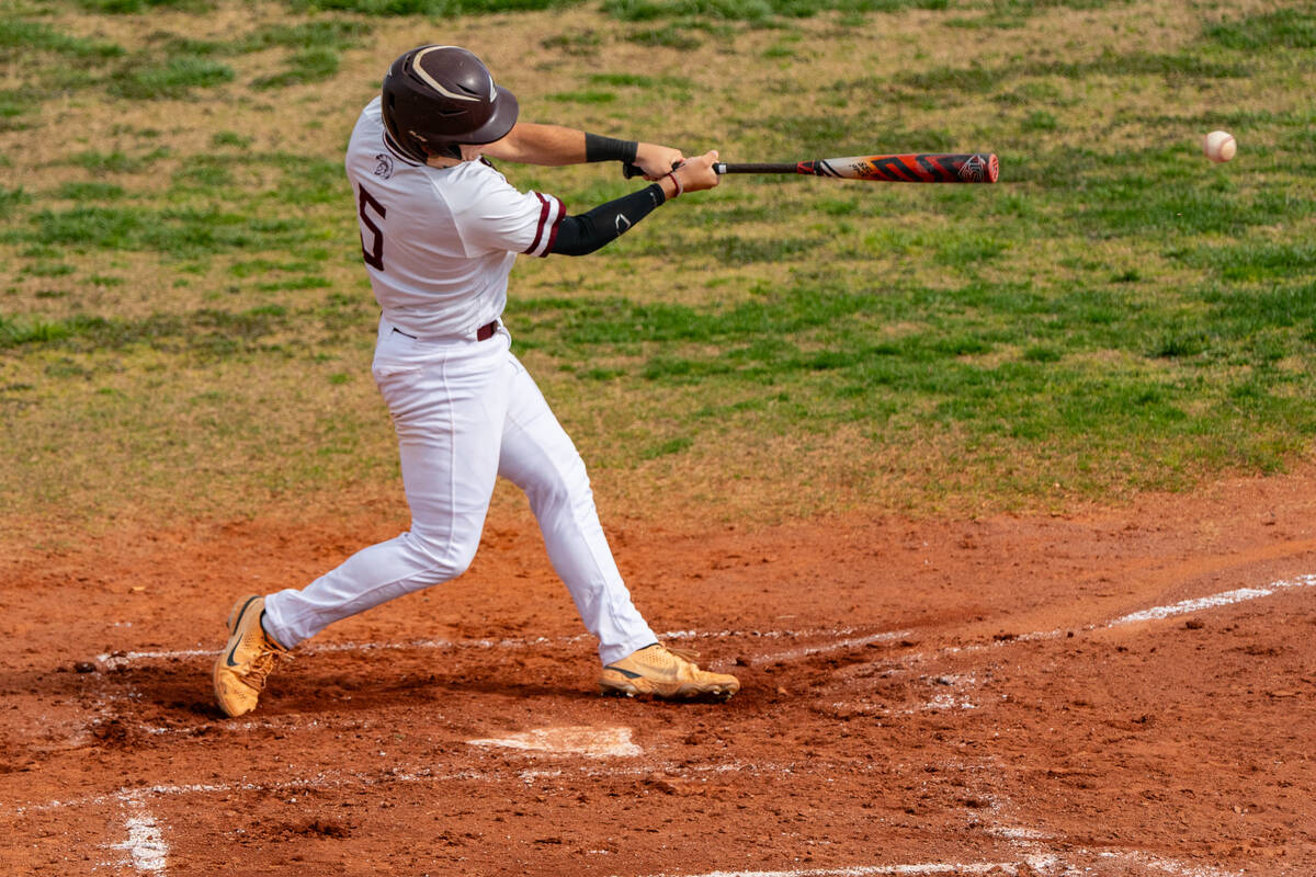 Pahrump Valley's Austin Sandoval (5) batting against the Spring Creek Spartan's in a close game ...