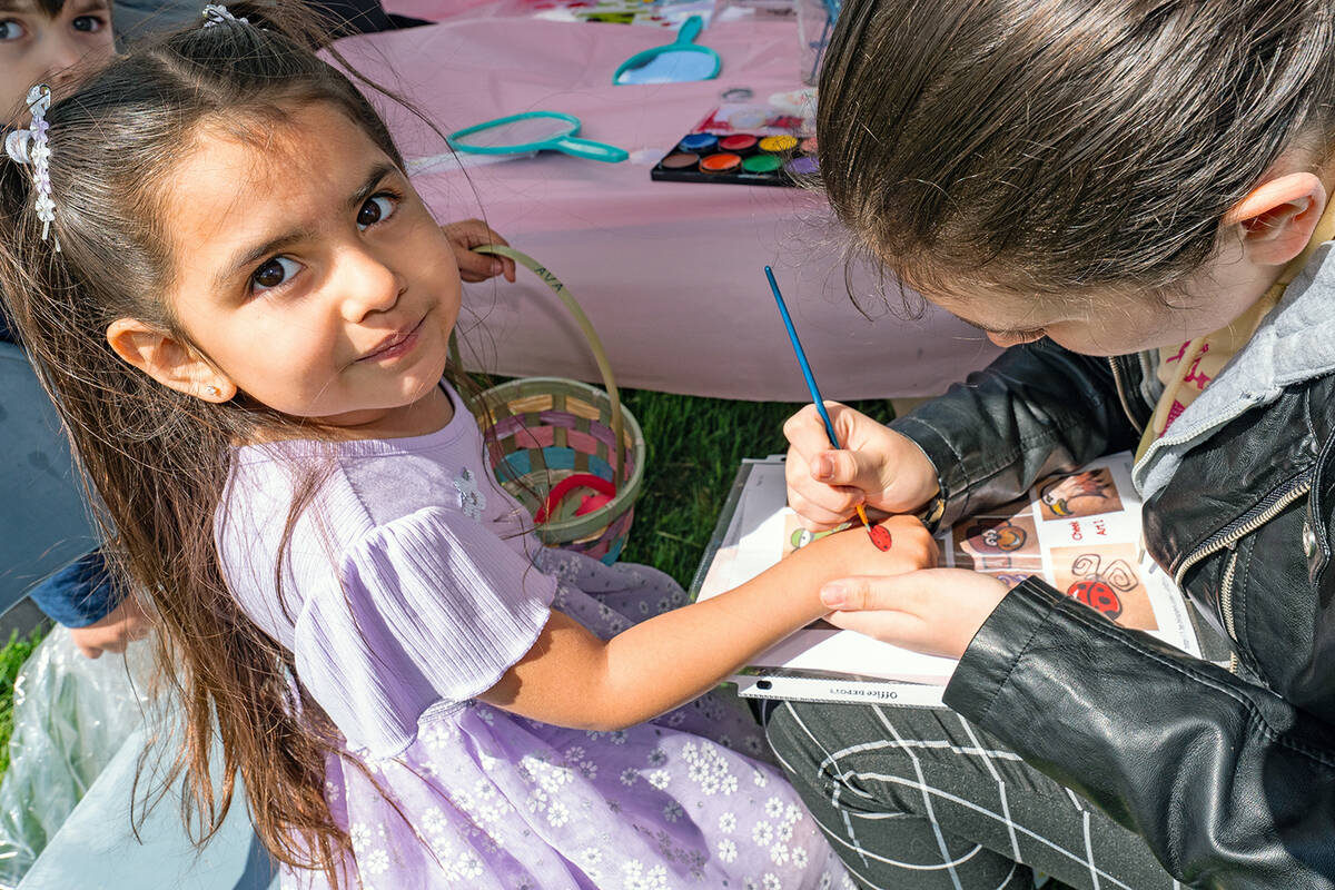 John Clausen/Pahrump Valley Times Face painting and even hand painting were a popular attractio ...