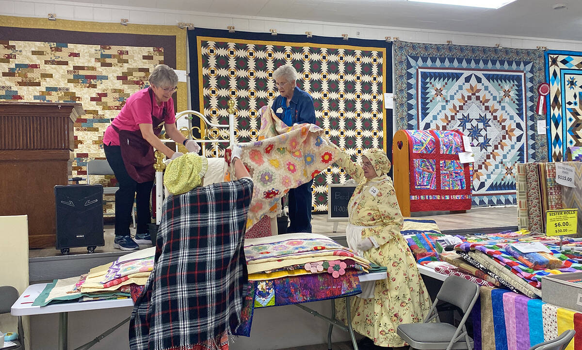 Robin Hebrock/Pahrump Valley Times Volunteers at the Shadow Mountain Quilters Pins and Needles ...