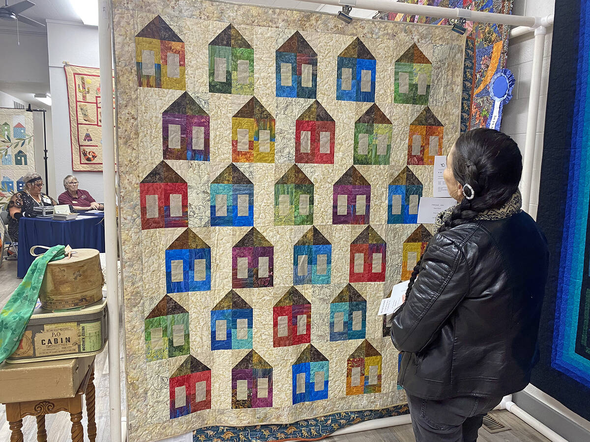 Robin Hebrock/Pahrump Valley Times A Pins and Needles Quilt Show attendee is pictured viewing " ...