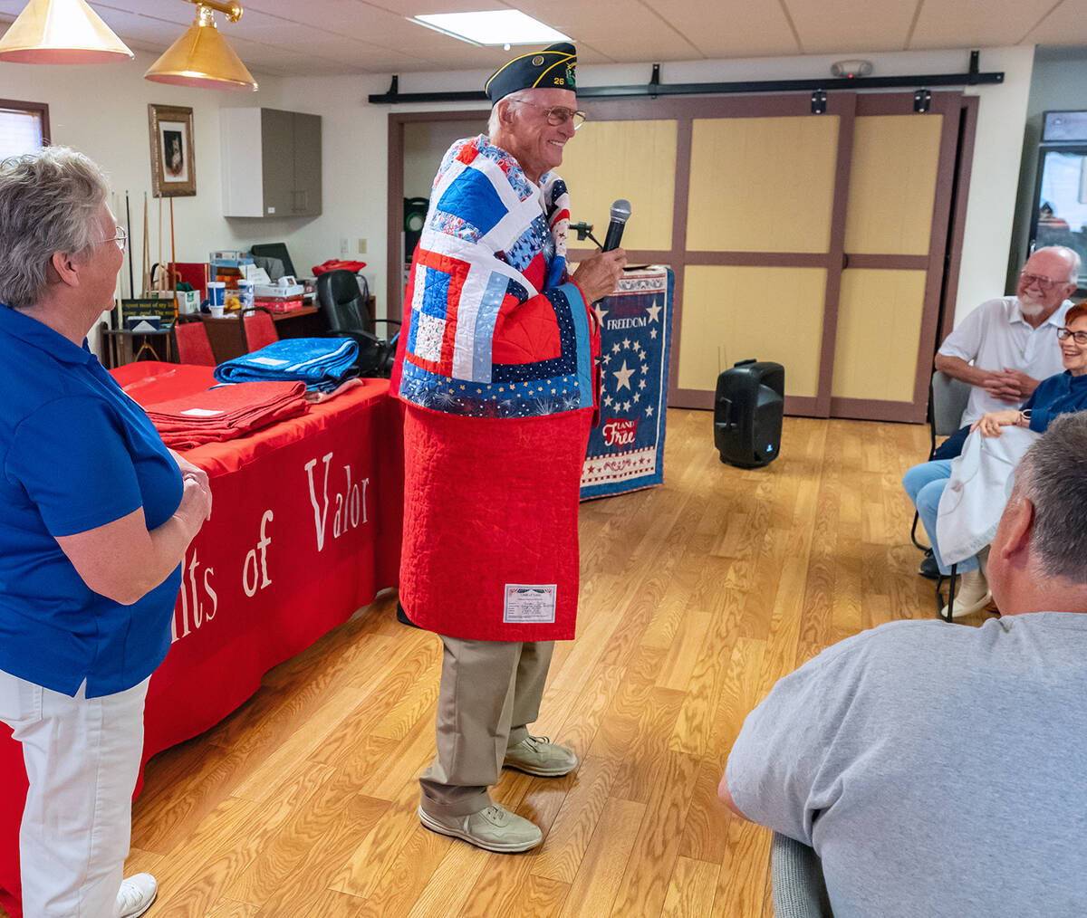 John Clausen/Pahrump Valley Times After receiving their Quilt of Valor, each veterans at the Am ...