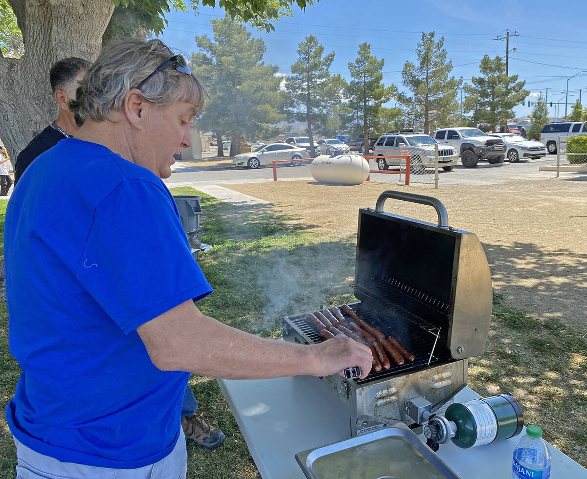 Robin Hebrock/Pahrump Valley Times John Klenke is shown grilling hotdogs for hungry Earth-Arbor ...